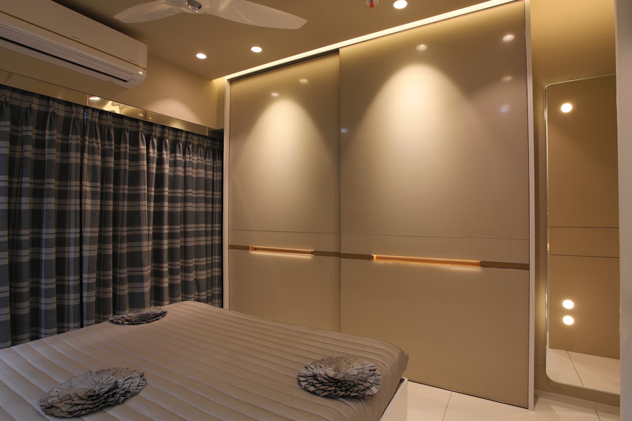 services-01 Sleek modern bedroom featuring contemporary design and ambient lighting.