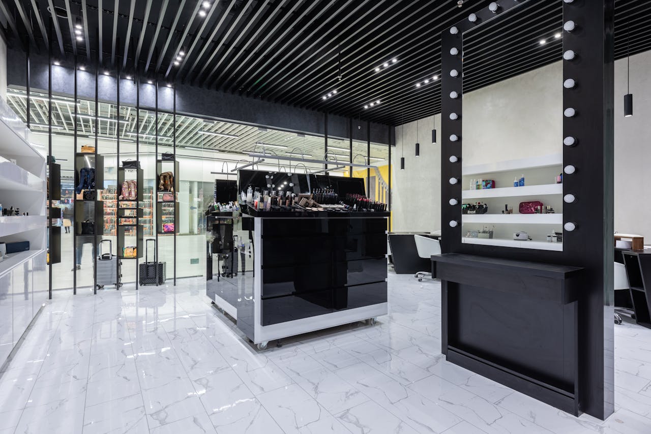about-us Sleek modern interior of a beauty store with cosmetics and chic decor.